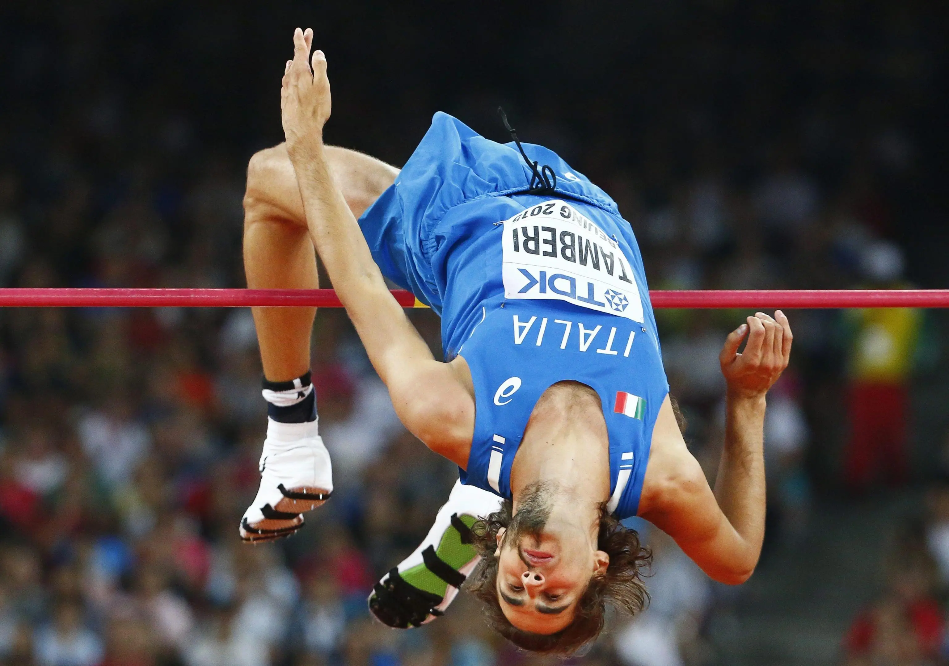 epa04905180 Italy's Gianmarco Tamberi competes in the men's High Jump final during the Beijing 2015 IAAF World Championships at the National Stadium, also known as Bird's Nest, in Beijing, China, 30 August 2015. EPA/DIEGO AZUBEL