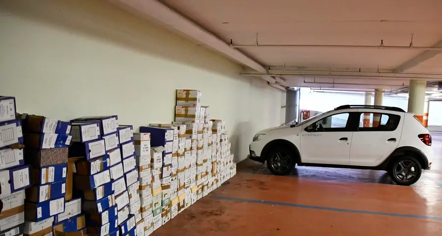 Nel garage di via Manzoni la documentazione di Amr