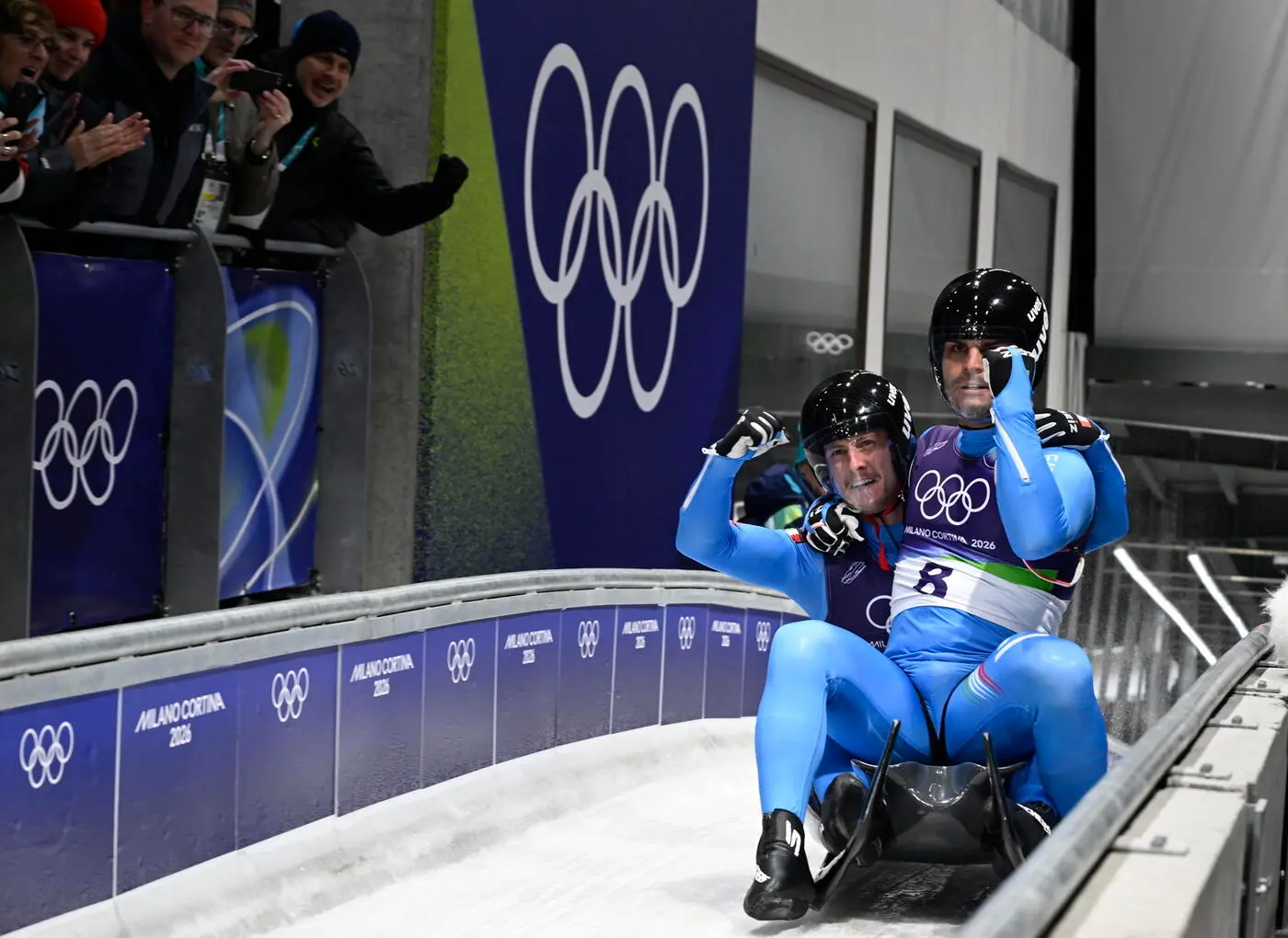 epa12728723 Emanuel Rieder and Simon Kainzwaldner of Italy celebrate after the Men's Doubles of the Luge competitions at the Milano Cortina 2026 Winter Olympic Games, in Cortina d'Ampezzo, Italy, 11 February 2026. EPA/DANIEL DAL ZENNARO