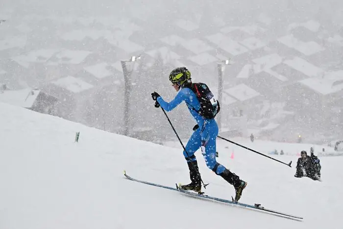TOPSHOT - Italy's Giulia Murada competes in the women's sprint ski mountaineering heat 3 during the Milano Cortina 2026 Winter Olympic Games at the Stelvio Ski Centre in Bormio (Valtellina) on February 19, 2026. (Photo by Fabrice COFFRINI / AFP)