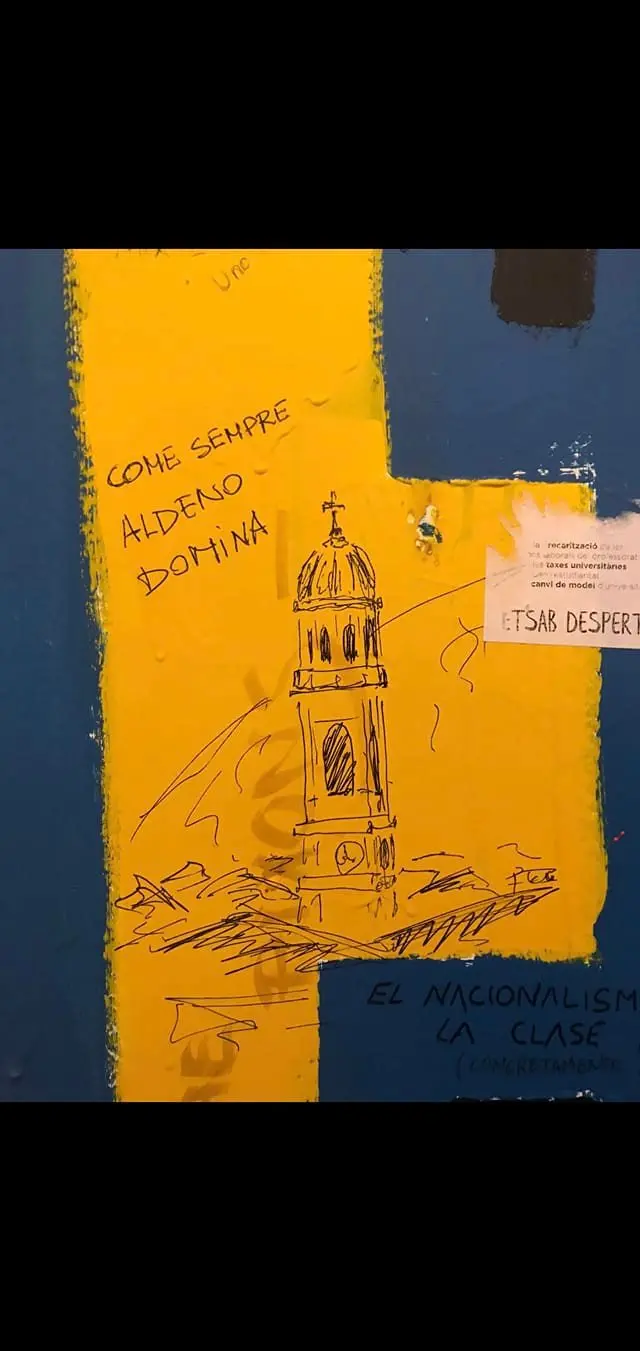 Il mistero dell’ “affresco” dedicato ad Aldeno nei bagni dell’università di Barcellona